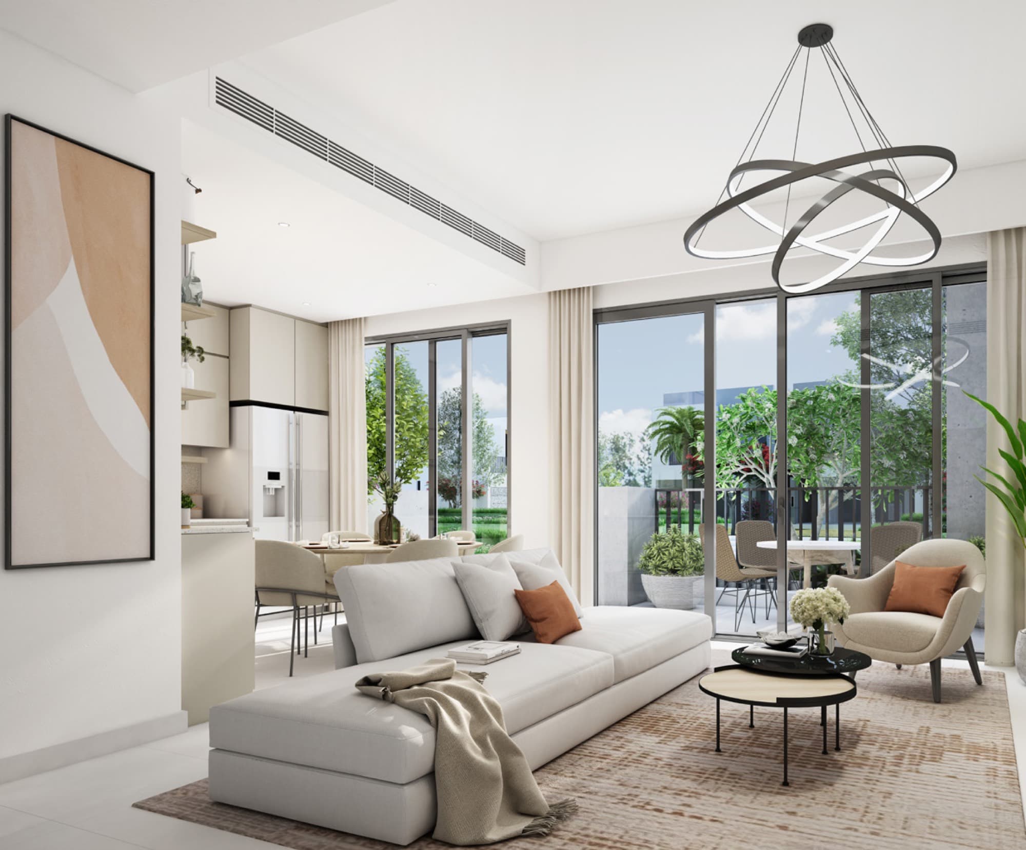 Open-plan living and dining room in a Bliss 2 townhouse, Arabian Ranches 3, Dubai, with a skylight and gallery wall art.