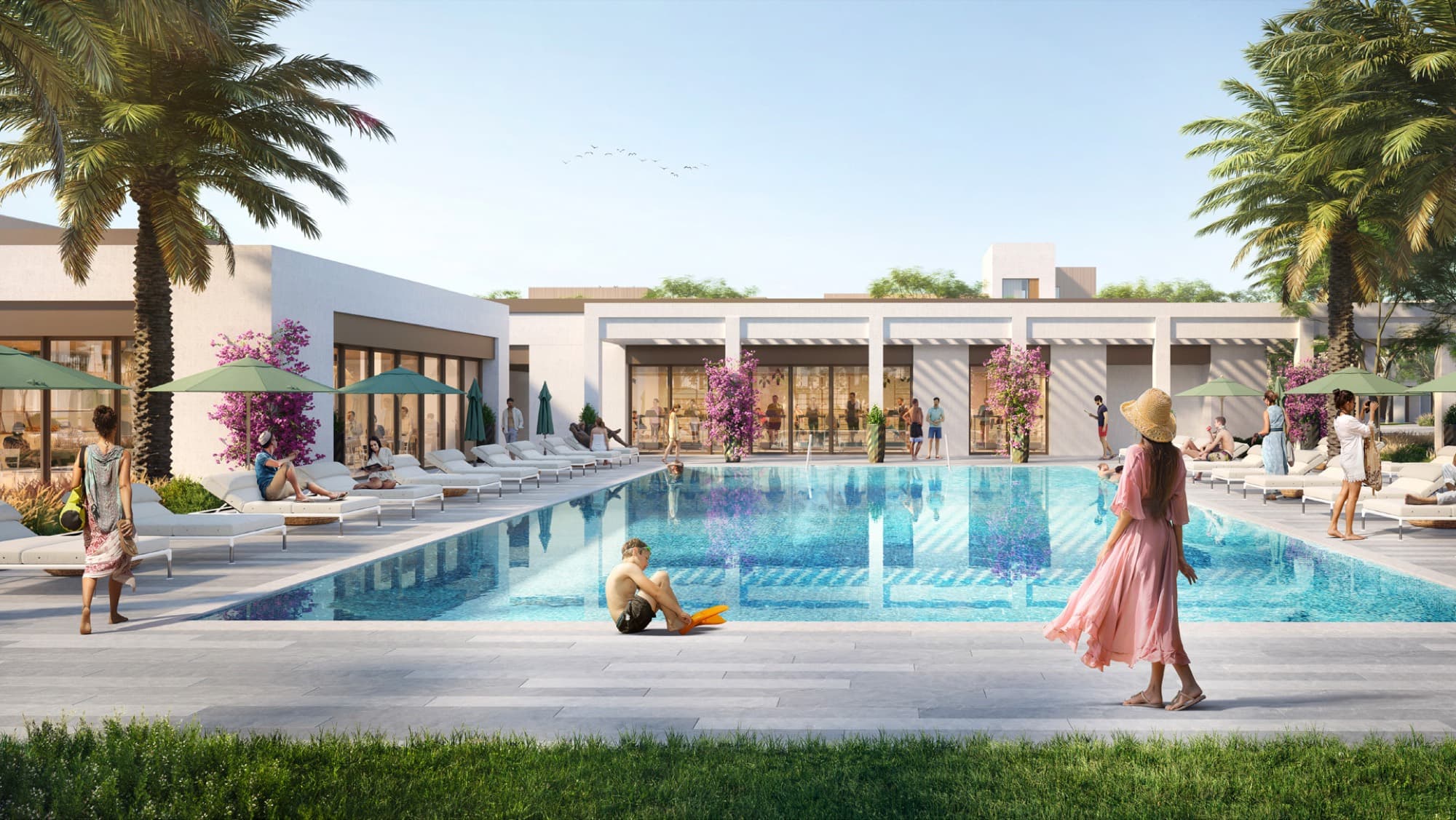 Community swimming pool and shaded lounge terrace at the Bliss 2 clubhouse, Arabian Ranches 3, Dubai.