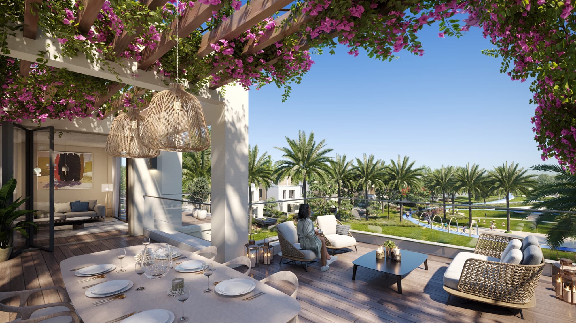 Covered terrace of a Caya 2 villa in Arabian Ranches 3, Dubai, with a bougainvillea pergola overlooking the community park.