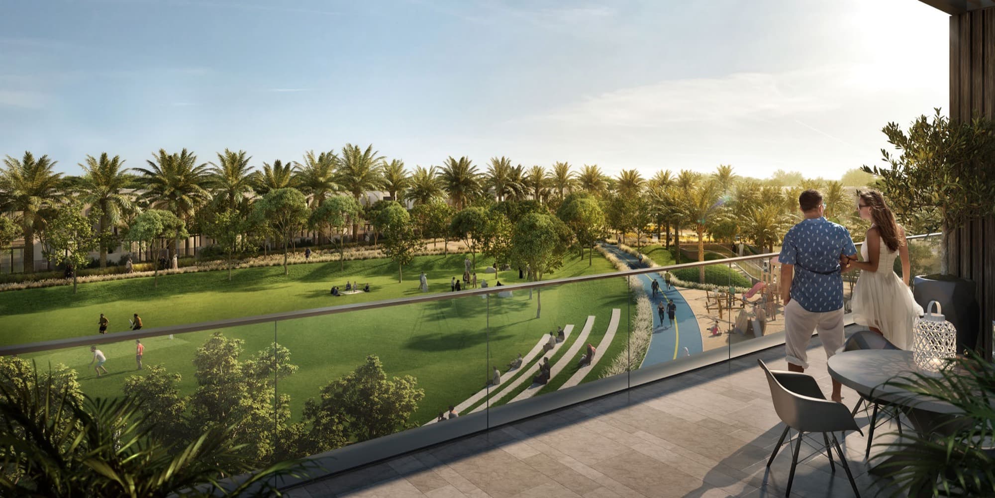 Balcony view over the landscaped park at Elie Saab Villas, Arabian Ranches 3, with a jogging track and residents below.