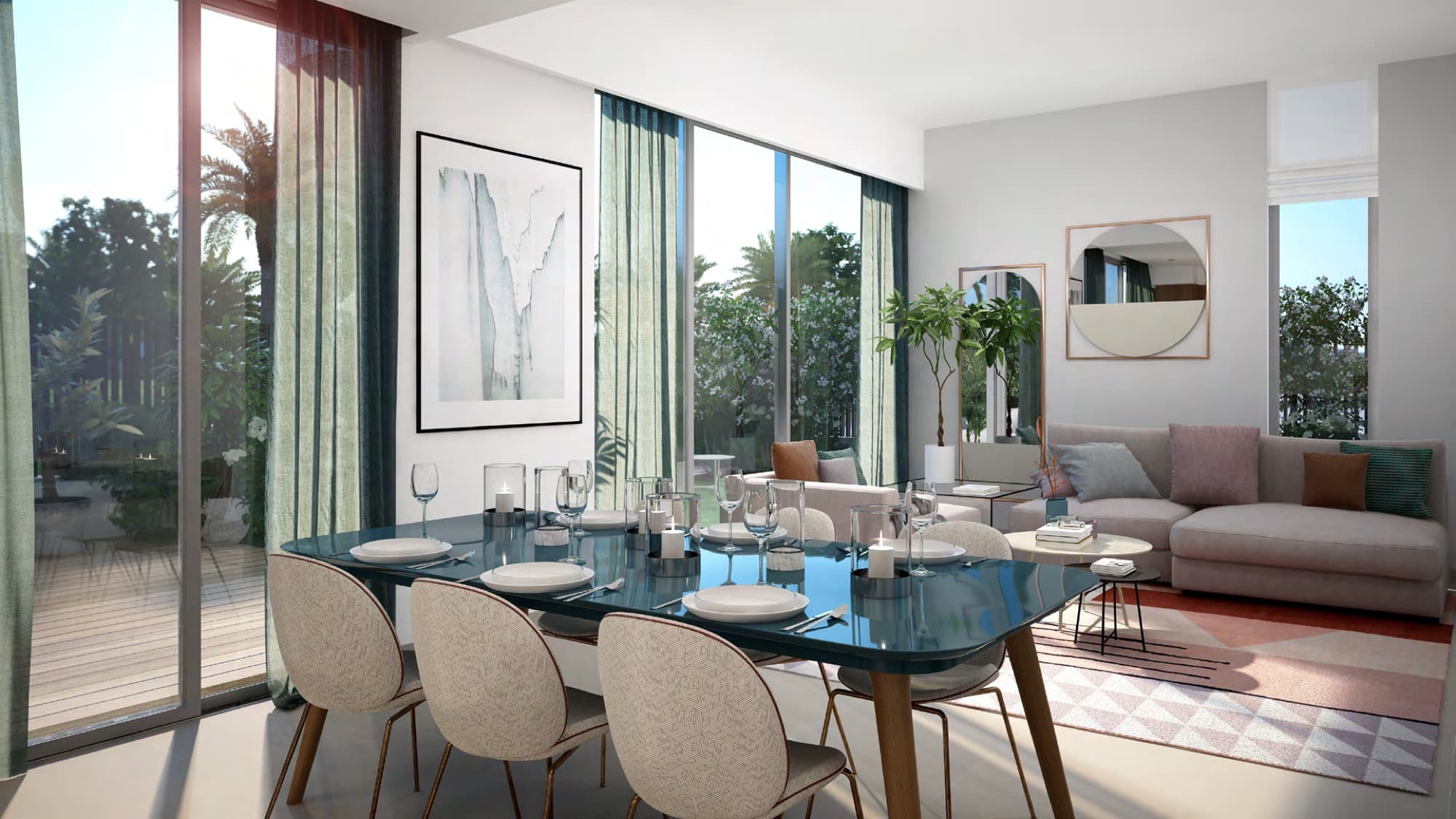 Living and dining room with statement blue table and grey sofa in a Joy townhouse, Arabian Ranches 3, Dubai.