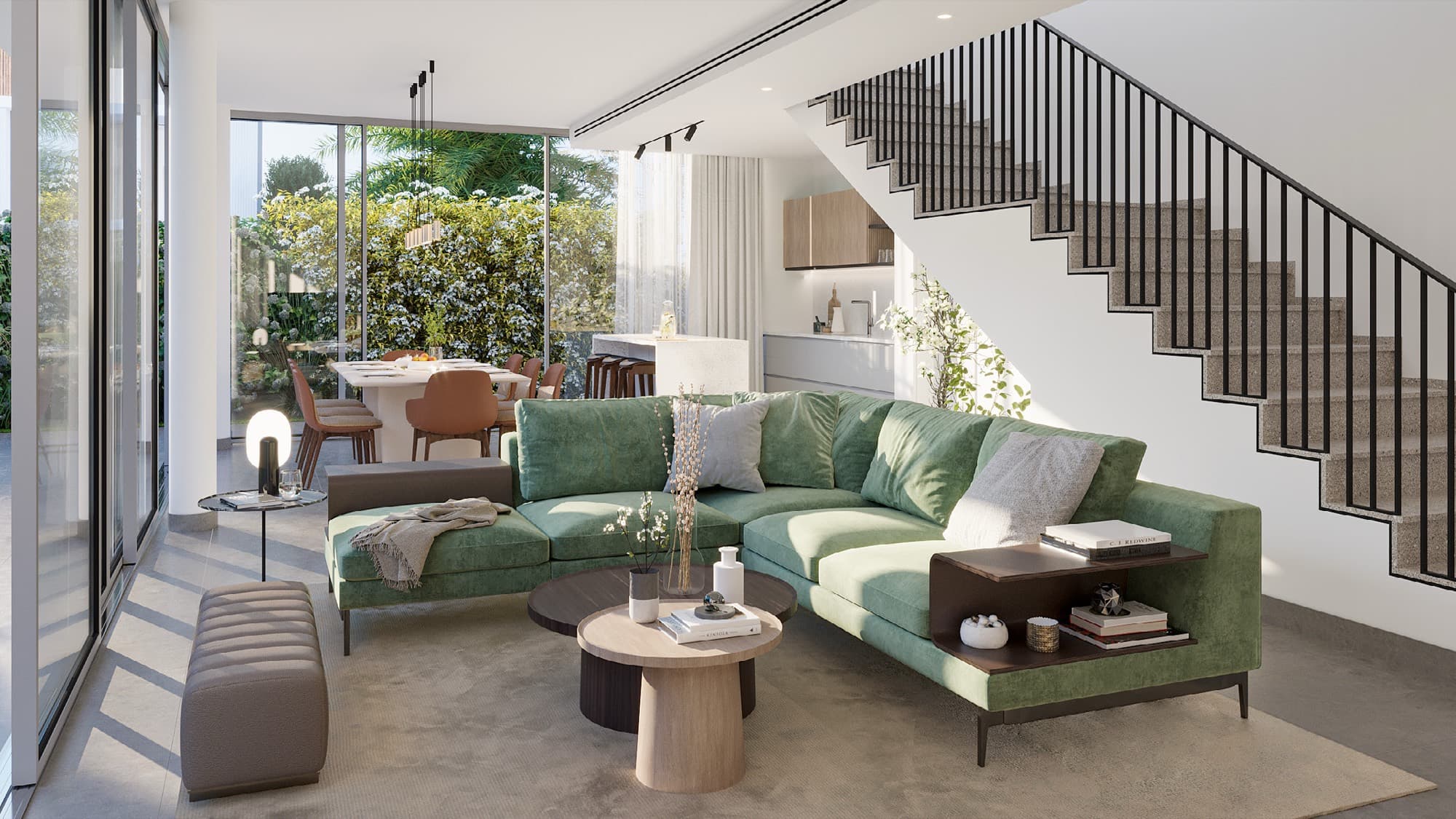 Dining area in a June villa, Arabian Ranches 3, Dubai, set for a family meal beside the open kitchen and staircase.