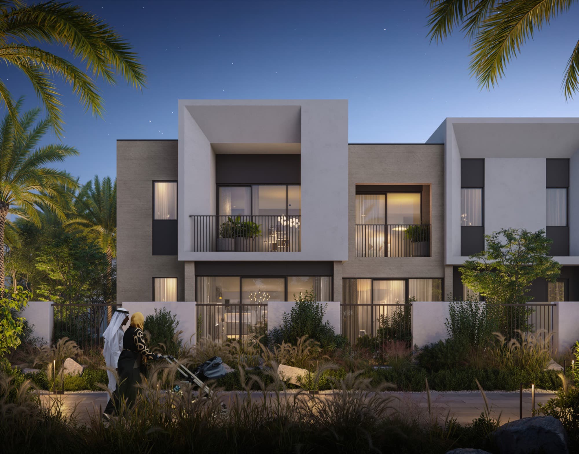 Evening view of a townhouse terrace in May, Arabian Ranches 3, Dubai, with a family walking past illuminated bedroom windows.