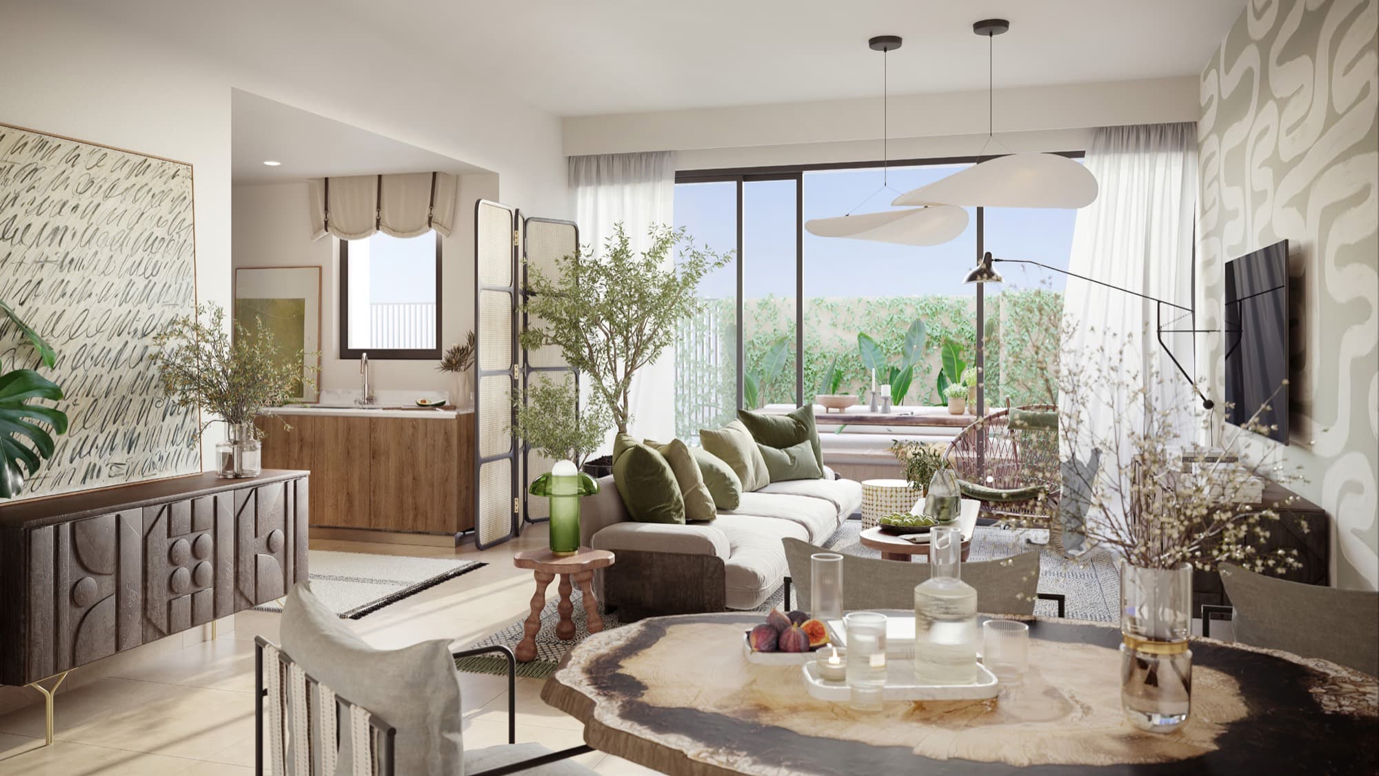 Open-plan living room in a May townhouse, Arabian Ranches 3, Dubai, with a sideboard, artwork and garden-facing sliding doors.