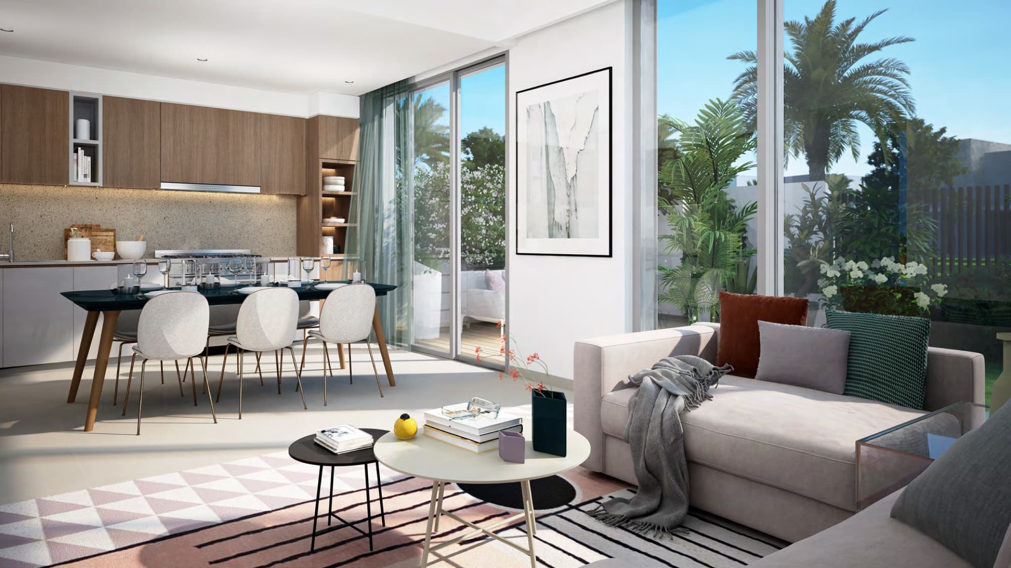 Open-plan kitchen and dining area with timber cabinetry in a Spring townhouse, Arabian Ranches 3, Dubai.