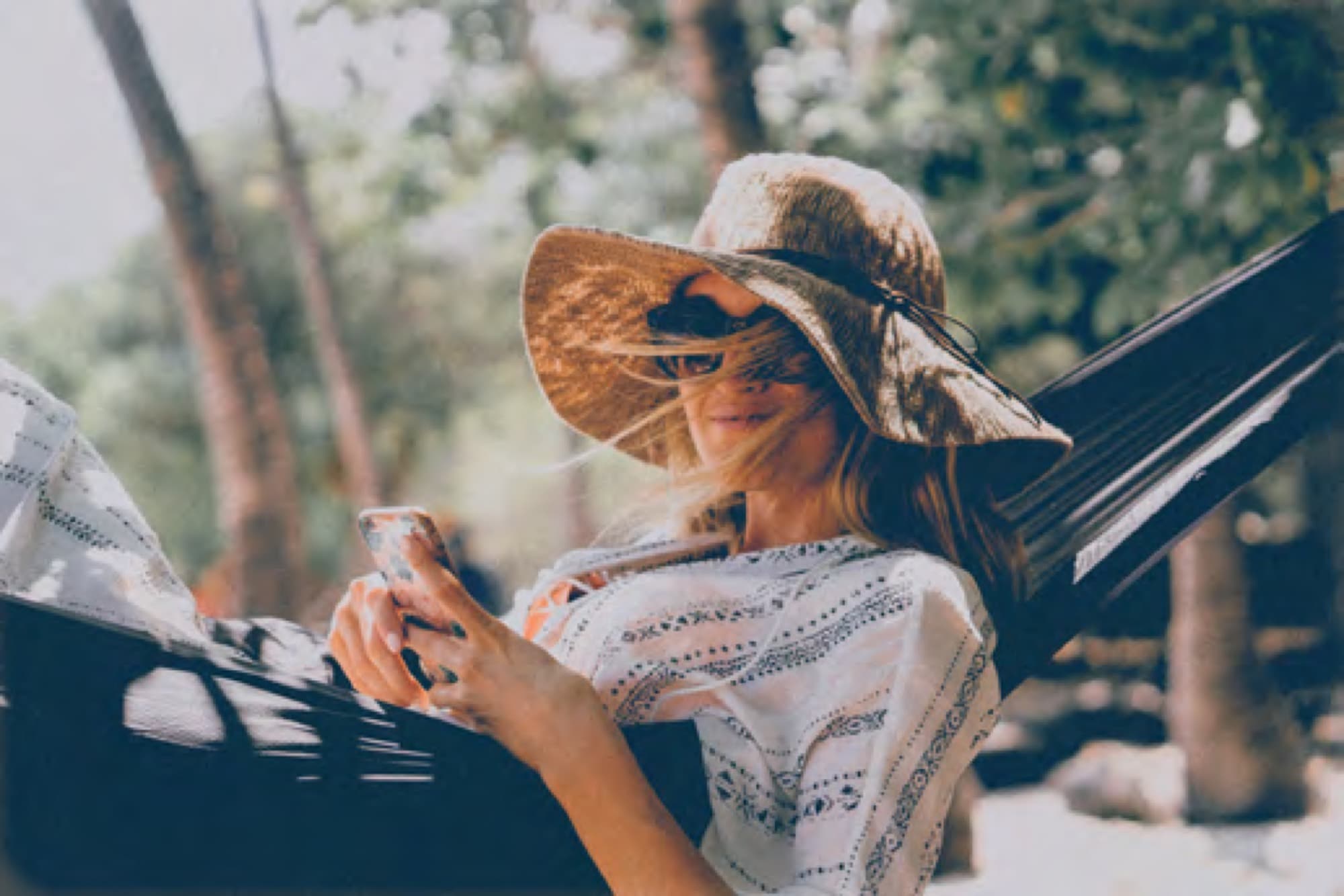 Woman relaxing in a garden hammock, enjoying everyday life in Arabian Ranches 3. AR3 Living is your resident-written, go-to guide to the whole community.